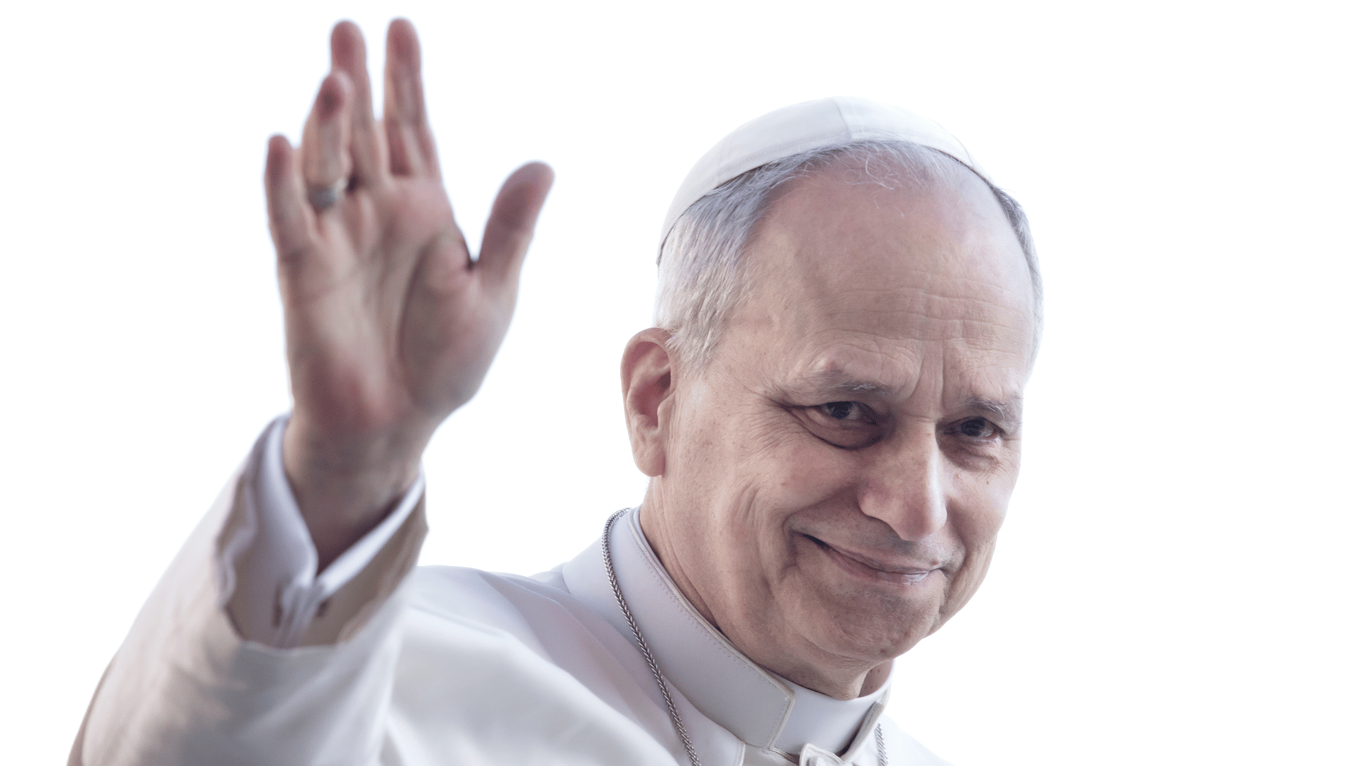 A imagem ilustra o Papa Leão XIV com suas habituais vestes pontifícias e o braço direito erguido em gesto de aceno.