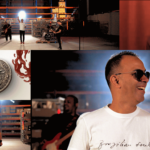 Montagem de imagens do clipe oficial da música tema do Acampamento PHN 2026. As cenas mostram a banda PHN em um espaço iluminado, Pitter Di Laura interpretando a canção, São Carlo Acutis em destaque e a medalha oficial do evento com a inscrição “PHN 2026” e a figura de um cordeiro. A composição remete ao tema “Alvejados, lavados pelo sangue do Cordeiro”.