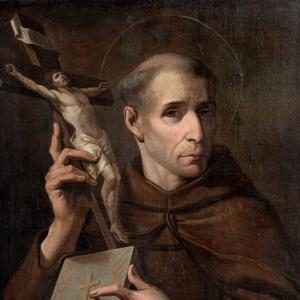 Imagem de São Leonardo de Porto Maurício, o rosto está de perfil, em sua mão direita segura um crucifixo e na esquerda um Bíblia. 