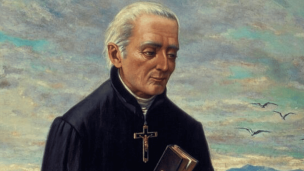 Pintura de São José de Anchieta. Ele veste uma batina preta, usa um crucifixo no peito e segura um livro.